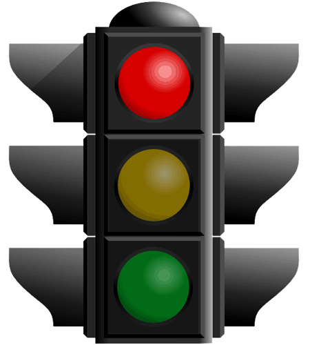 Traffic signal changing from red to yellow to green as an example when to invest in a local market